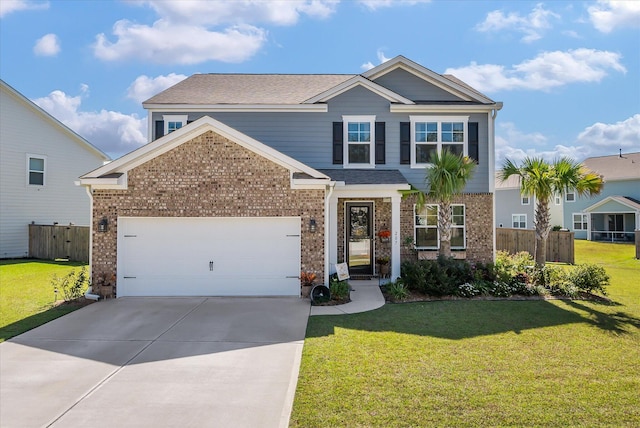 view of front of property featuring a garage and a front yard