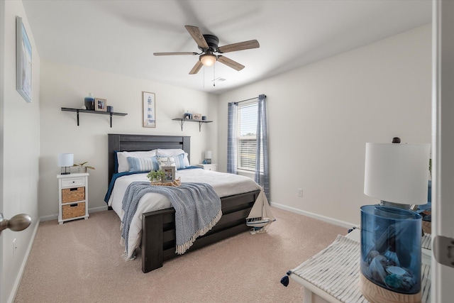 bedroom with light colored carpet and ceiling fan