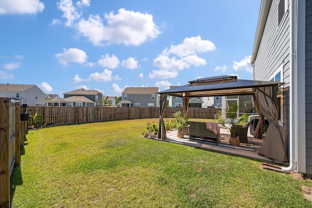 view of yard featuring a patio and a gazebo