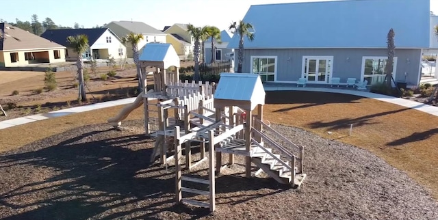 view of playground featuring french doors