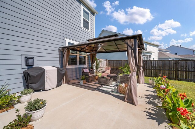 view of patio with an outdoor hangout area, a gazebo, and grilling area