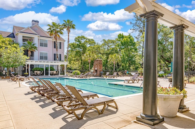 view of swimming pool featuring a patio area