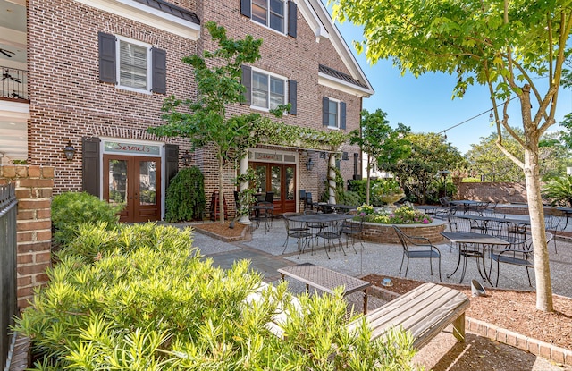 view of patio featuring french doors