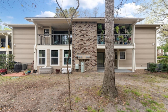 1860 Montclair Dr Unit 1860-A, Mount Pleasant, SC 29464 - back of house featuring a balcony and cooling unit