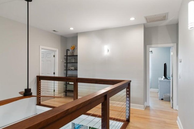 hall featuring light hardwood / wood-style floors