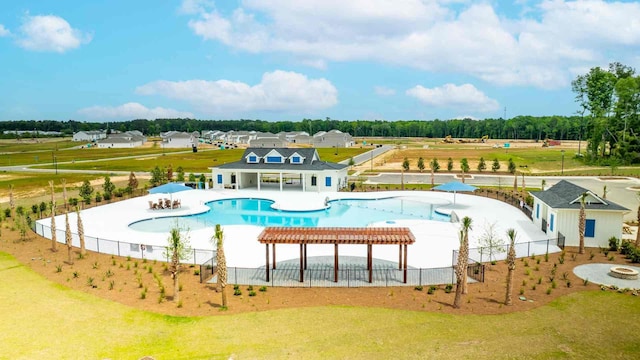 view of swimming pool featuring a pergola