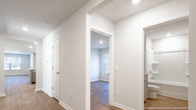 hallway featuring light hardwood / wood-style flooring