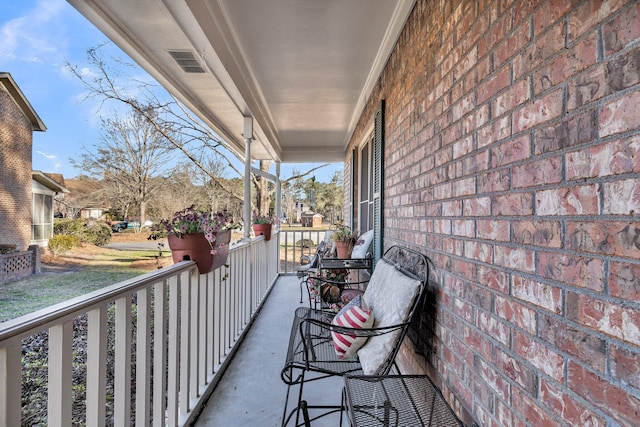 balcony featuring covered porch