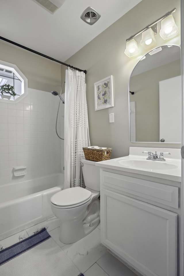 full bathroom featuring toilet, vanity, and shower / tub combo