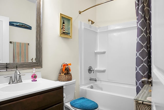 full bathroom featuring vanity, toilet, and shower / tub combo