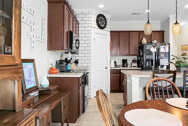 kitchen featuring pendant lighting, black appliances, crown molding, light tile patterned floors, and dark brown cabinetry