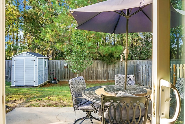 view of patio / terrace featuring a storage shed