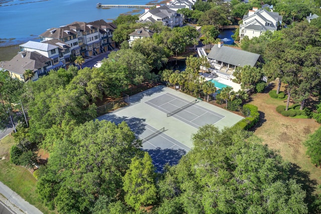 birds eye view of property with a water view and a residential view