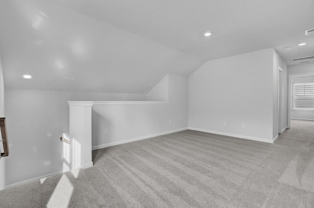 bonus room featuring carpet flooring, lofted ceiling, recessed lighting, and baseboards