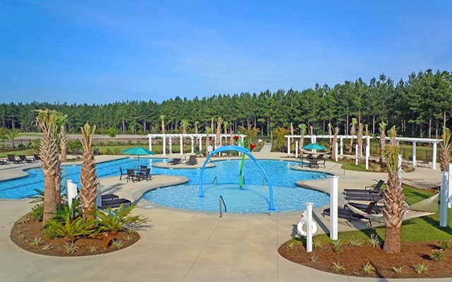 community pool featuring a patio