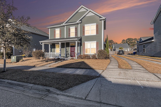 front of property featuring a porch