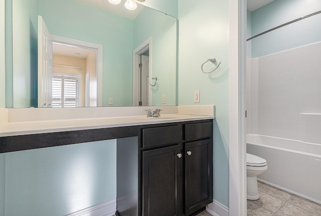 full bathroom with vanity, toilet, and washtub / shower combination