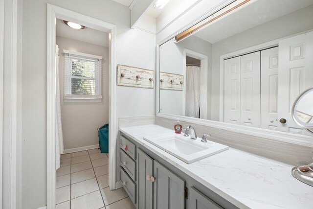 bathroom with vanity and tile patterned floors