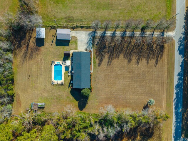 birds eye view of property featuring a rural view