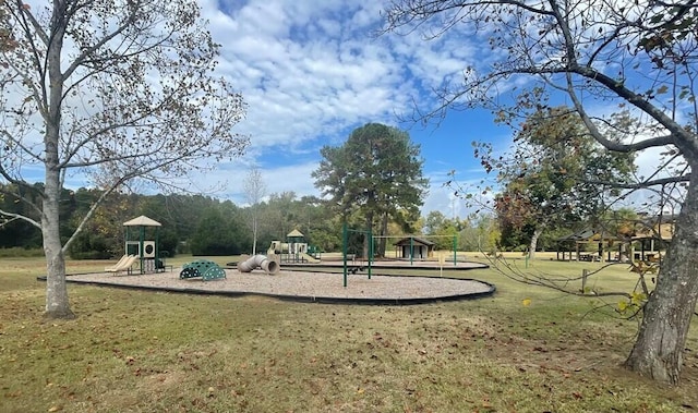 view of playground featuring a lawn