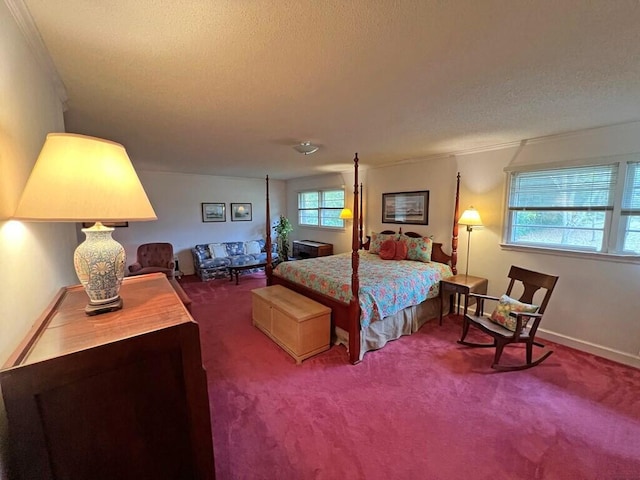 carpeted bedroom with crown molding and a textured ceiling