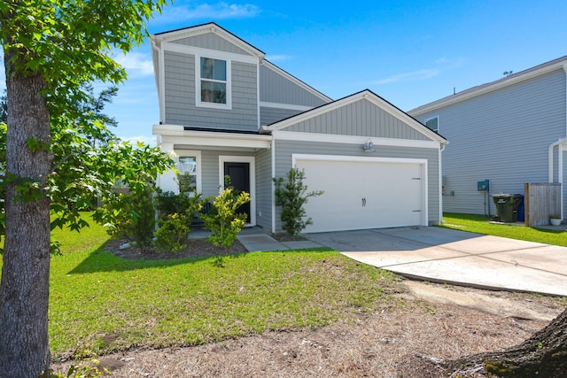 630 Jancus St, Charleston, SC 29414 - view of front of home with a garage, a front yard, board and batten siding, and driveway