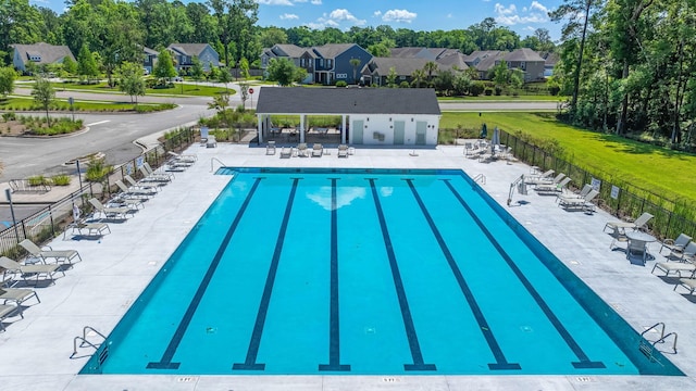 630 Jancus St, Charleston, SC 29414 - community pool with fence, a residential view, a patio, and view of wooded area