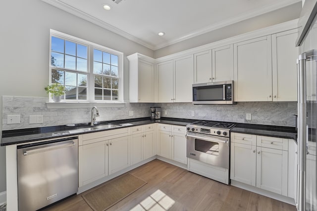 kitchen featuring dark countertops, backsplash, and stainless steel appliances