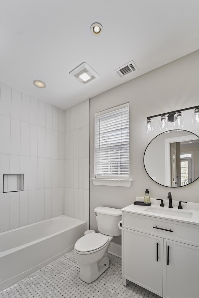 bathroom featuring vanity, visible vents, recessed lighting, bathing tub / shower combination, and toilet