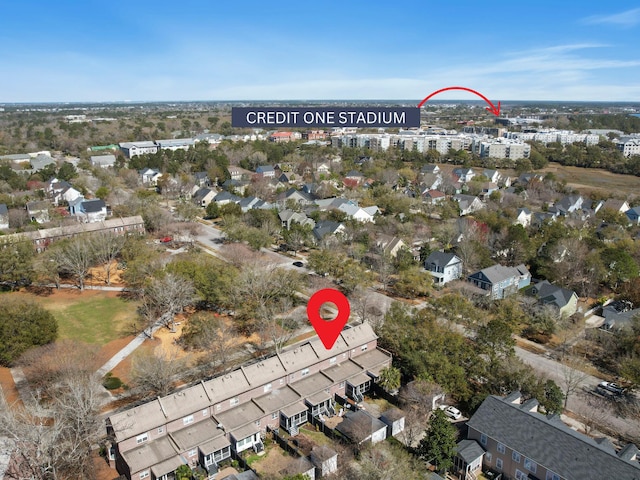 birds eye view of property with a residential view