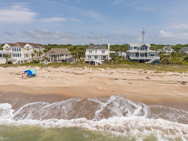 1404 Palmetto Blvd, Edisto Beach, SC 29438 - aerial view featuring a water view, a residential view, and a view of the beach