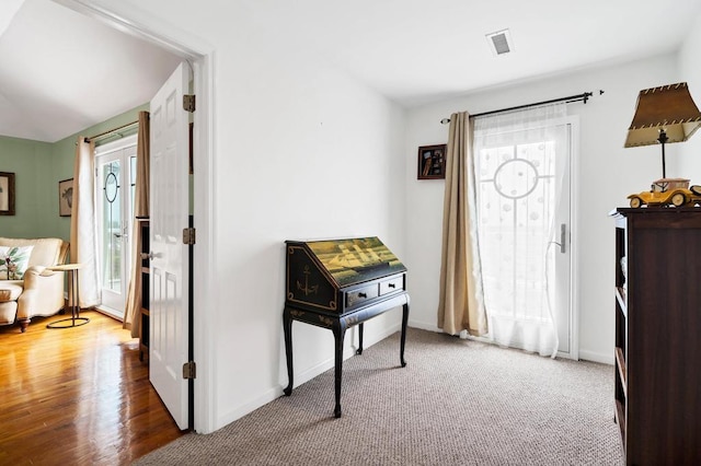 1404 Palmetto Blvd, Edisto Beach, SC 29438 - foyer with baseboards, a healthy amount of sunlight, and visible vents