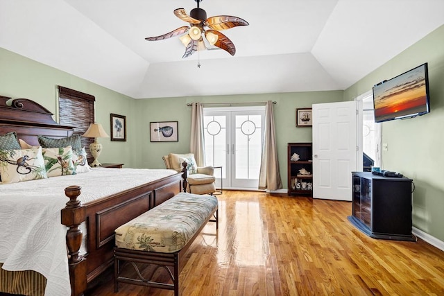 1404 Palmetto Blvd, Edisto Beach, SC 29438 - bedroom with lofted ceiling, wood finished floors, and multiple windows