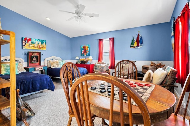 1404 Palmetto Blvd, Edisto Beach, SC 29438 - carpeted dining area with lofted ceiling and ceiling fan
