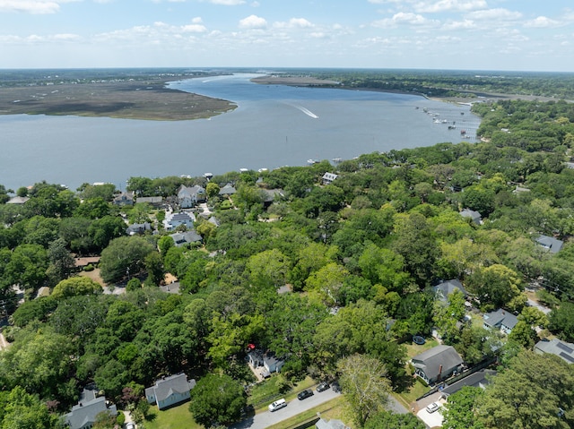 drone / aerial view with a residential view and a water view