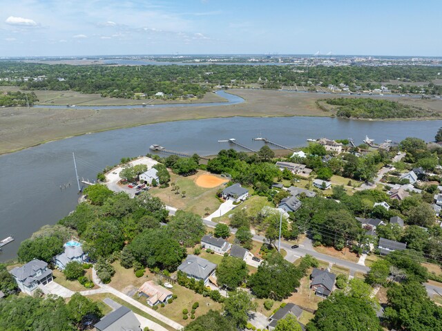 drone / aerial view with a water view and a residential view