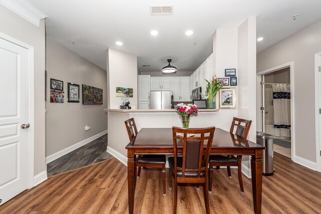 1121 Basildon Rd, Mount Pleasant, SC 29466 - dining area with wood finished floors and recessed lighting