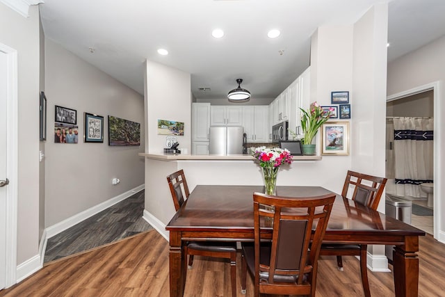1121 Basildon Rd, Mount Pleasant, SC 29466 - dining space with wood finished floors and recessed lighting