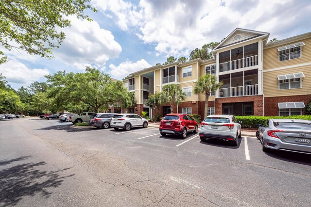 1121 Basildon Rd, Mount Pleasant, SC 29466 - view of building exterior featuring uncovered parking