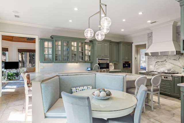 dining area featuring crown molding