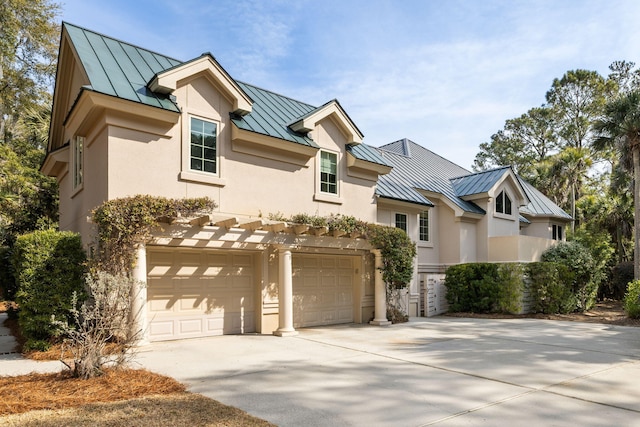 view of front of property with a garage