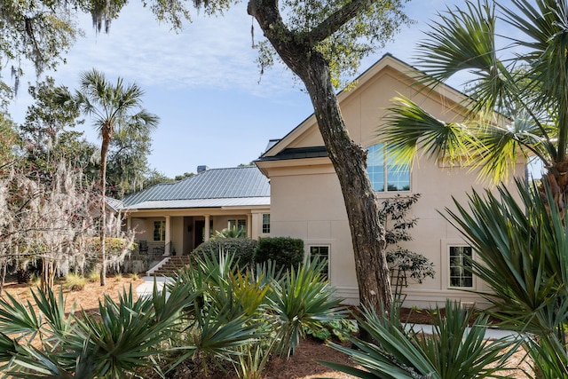 exterior space featuring covered porch