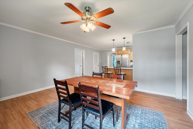 14 Aldene Ave, Goose Creek, SC 29445 - dining space featuring light wood-style floors, a ceiling fan, baseboards, and ornamental molding