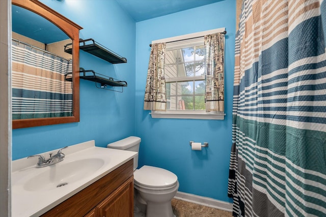 14 Aldene Ave, Goose Creek, SC 29445 - full bathroom featuring vanity, toilet, baseboards, and a shower with shower curtain
