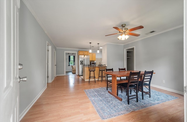 14 Aldene Ave, Goose Creek, SC 29445 - dining area featuring ceiling fan, light wood finished floors, crown molding, and baseboards