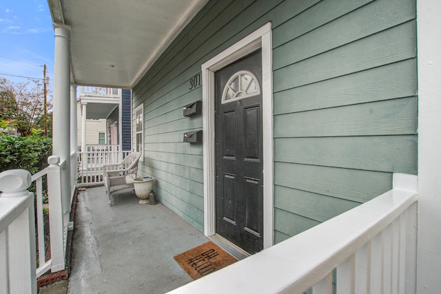 balcony featuring a porch