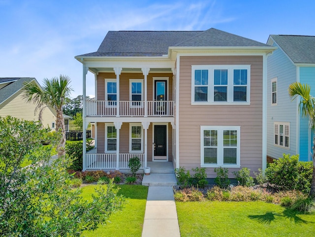 357 Parish Farms Dr, Summerville, SC 29486 - view of front of home with covered porch, a balcony, a front lawn, and roof with shingles