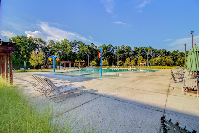 357 Parish Farms Dr, Summerville, SC 29486 - community pool featuring a patio area and view of scattered trees