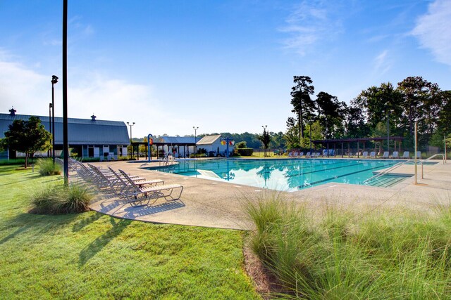 357 Parish Farms Dr, Summerville, SC 29486 - community pool featuring a lawn and a patio area