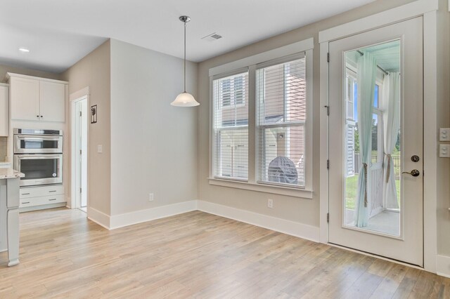 357 Parish Farms Dr, Summerville, SC 29486 - unfurnished dining area featuring light wood-style floors and baseboards